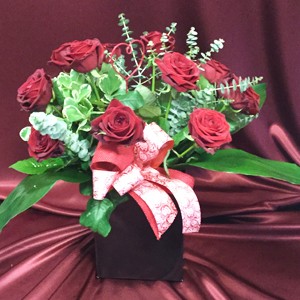 12 Red Roses Hand Tied in a Box